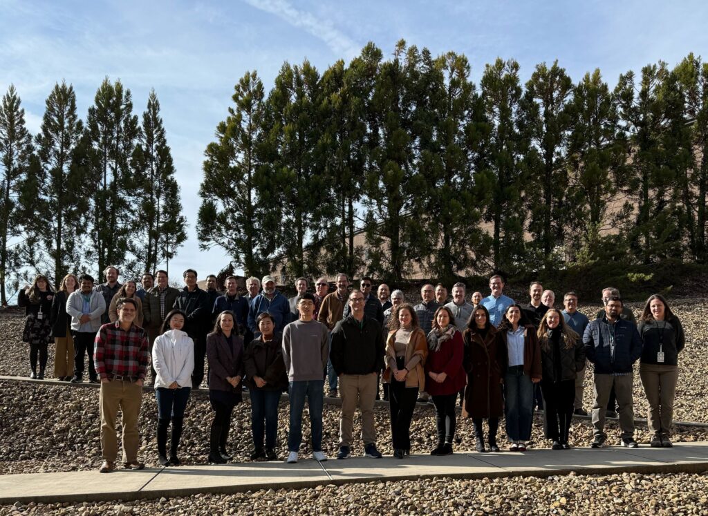 Members of PMI stand together.